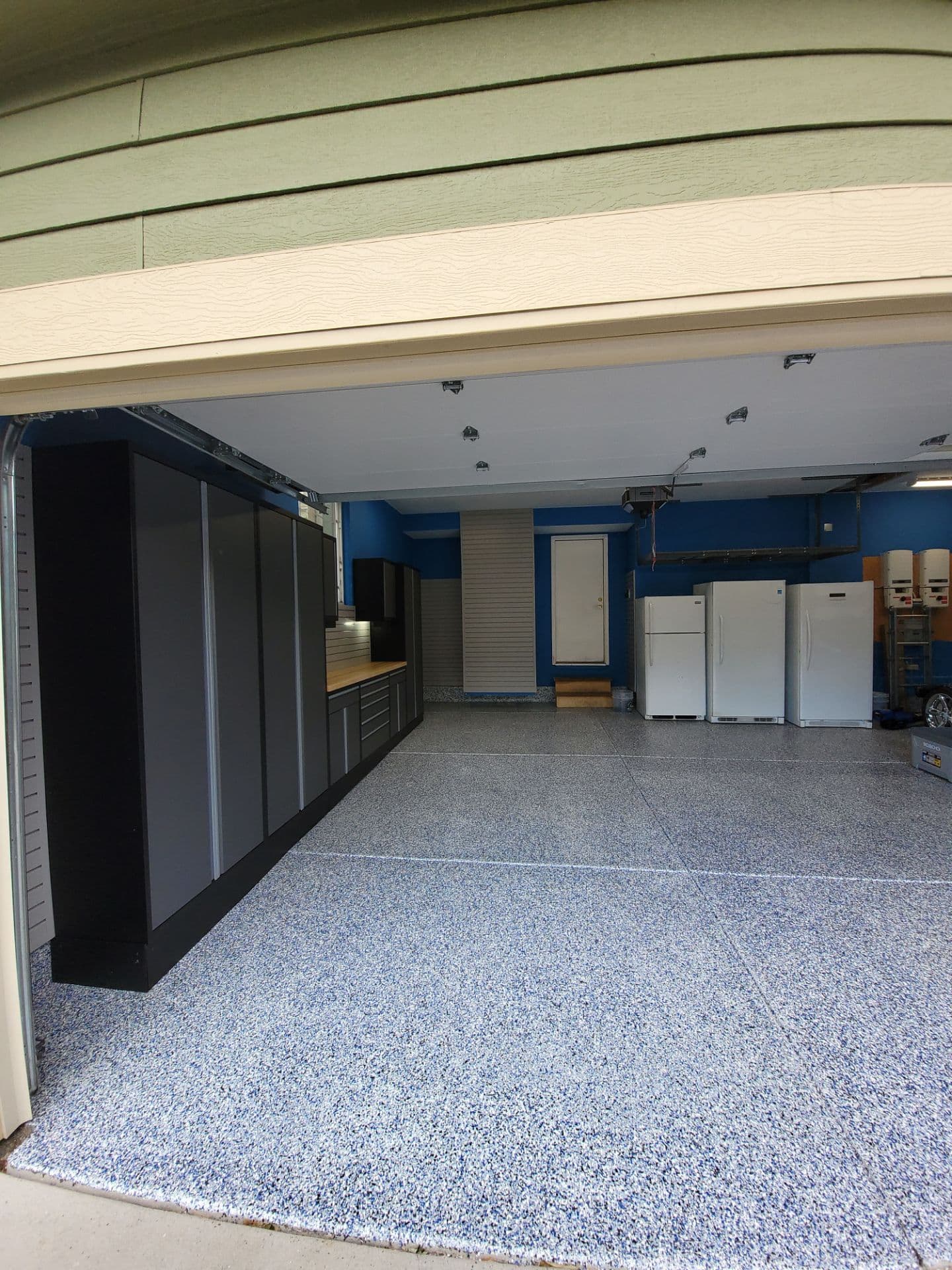 Stunning Garage Transformation with Epoxy Flooring image