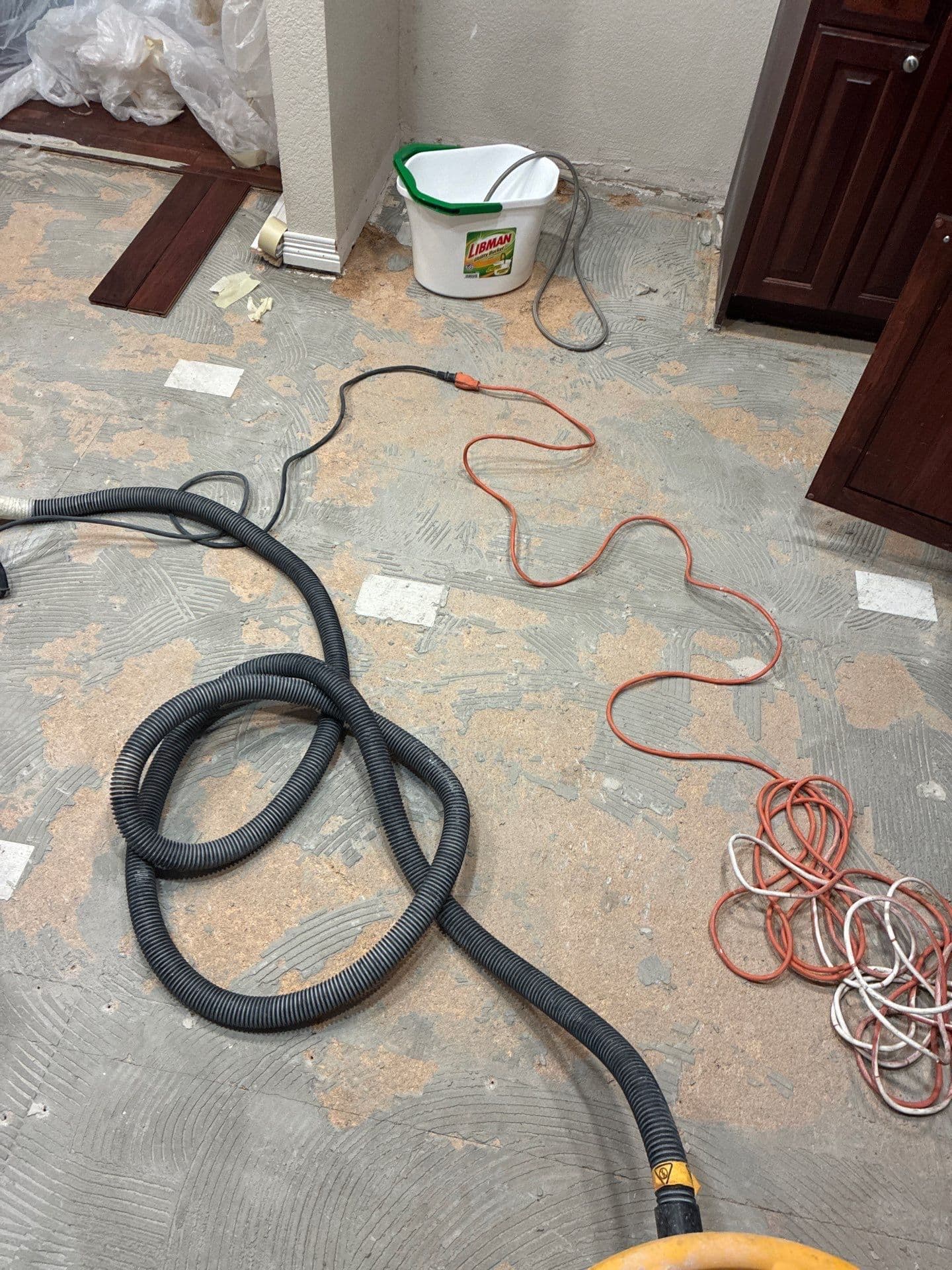 Gallery photos for Kitchen Floor Swap - Old Tile Out, Hardwood Look In: Image #2