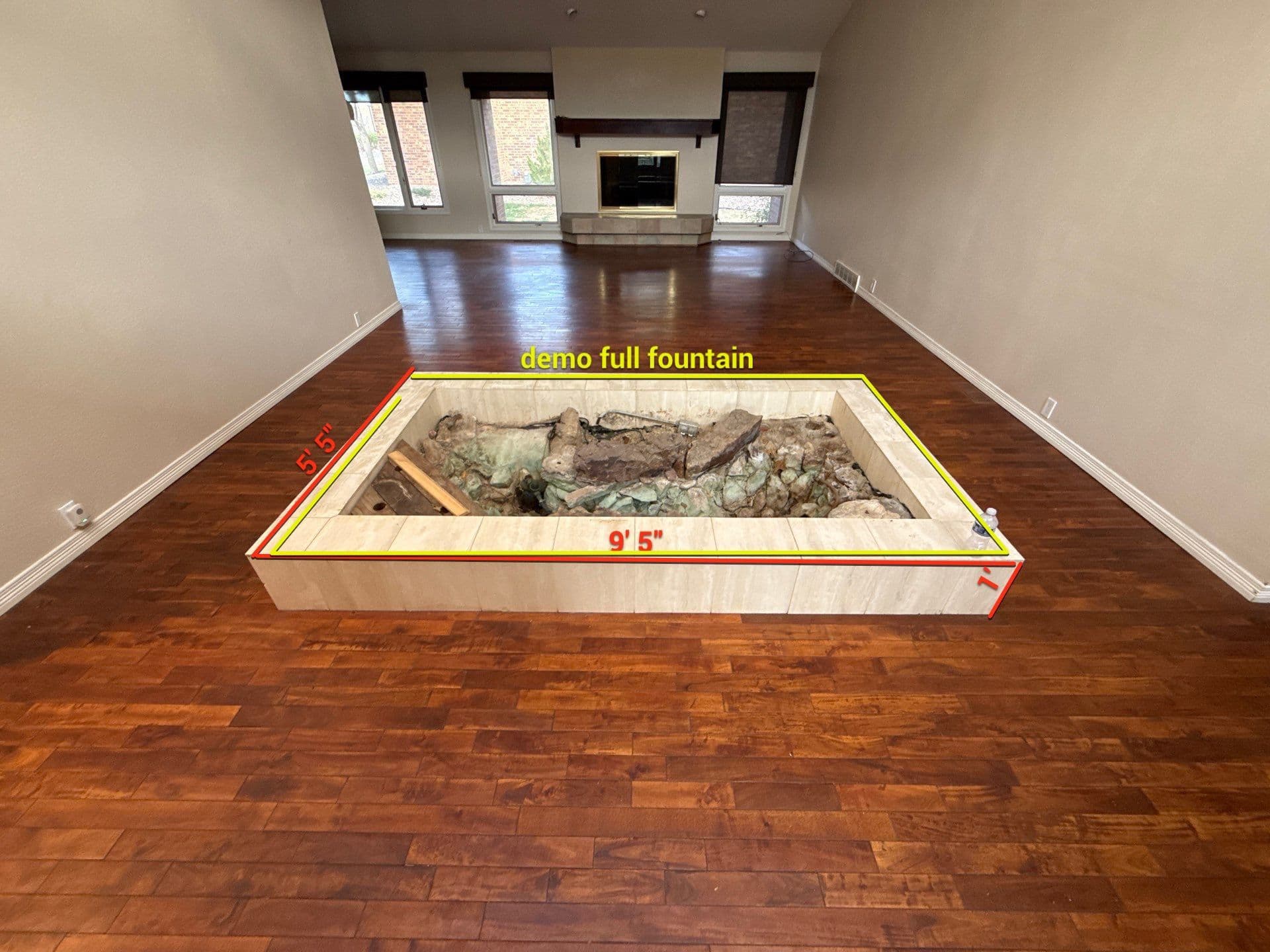 Project Indoor Water Feature Removed and Rebuilt With Herringbone Engineered Wood Floor image