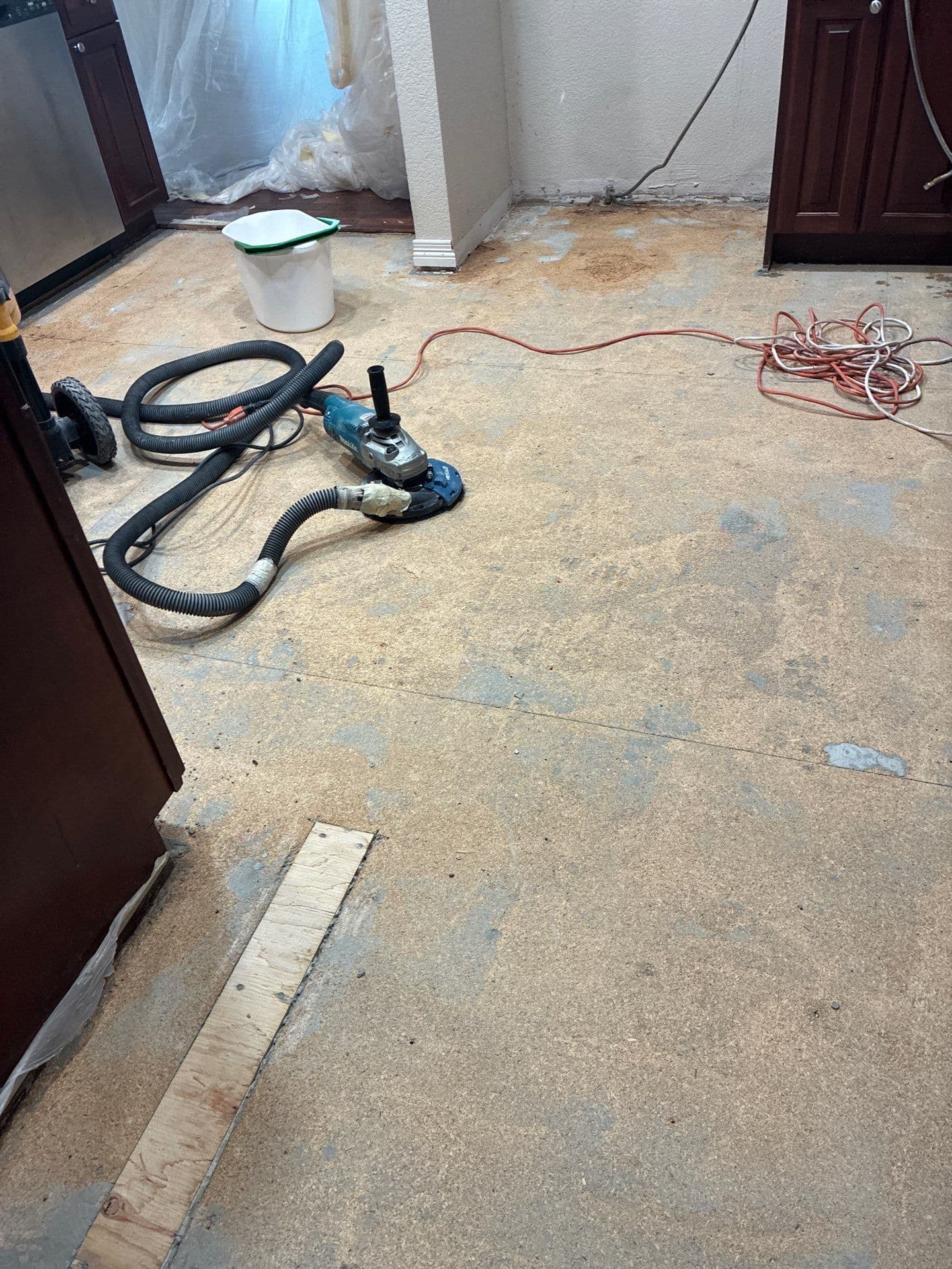Gallery photos for Kitchen Floor Swap - Old Tile Out, Hardwood Look In: Image #3