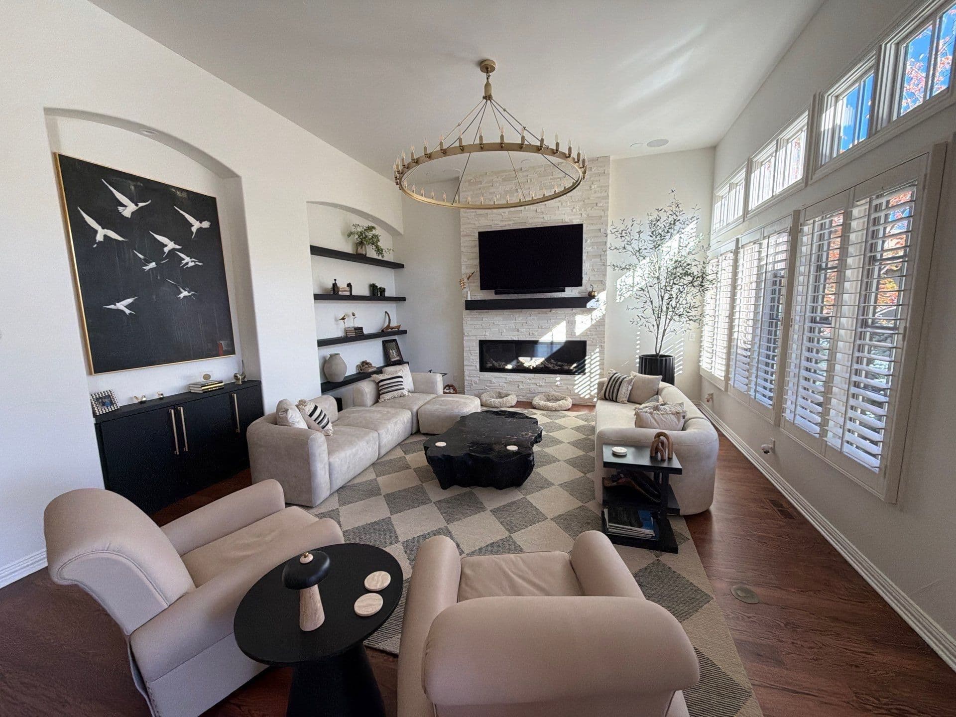 Chic Living Room Makeover with Custom Fireplace and Shelving image