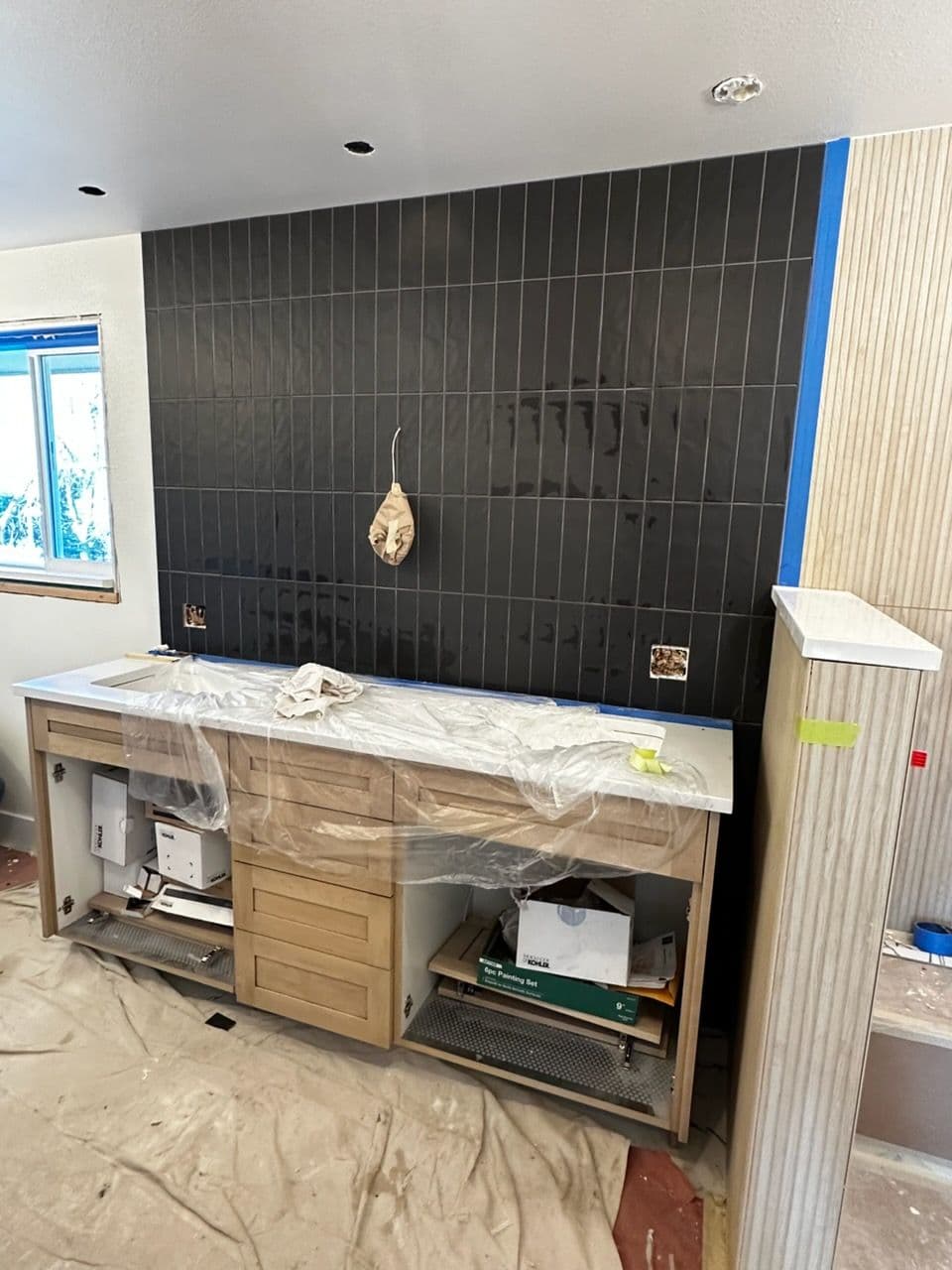 Project Stylish Dark Tile Backsplash Installation image