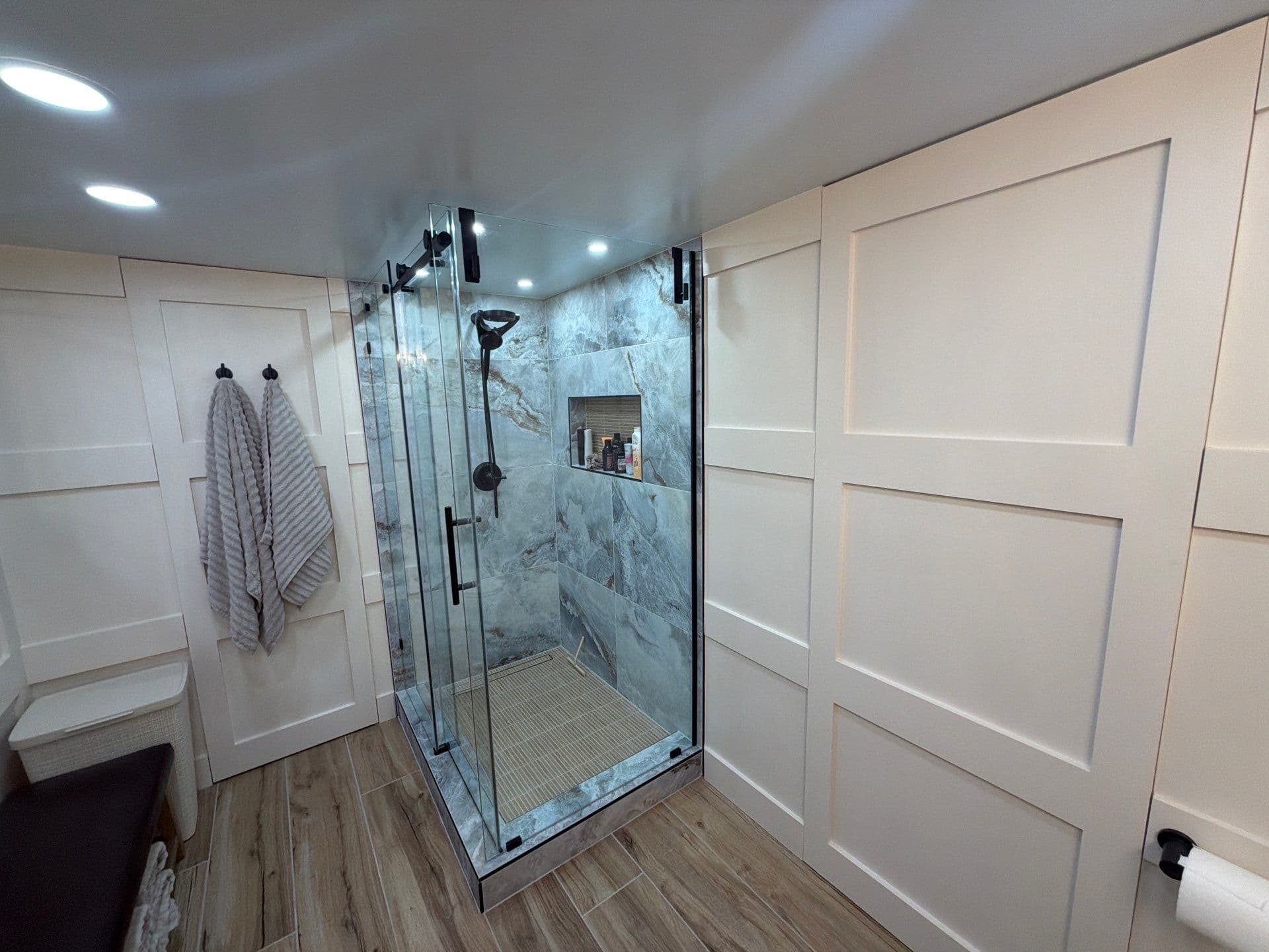 Gallery photos for Custom Bathroom Remodel with Hidden Doors and Glass Shower: Image #1